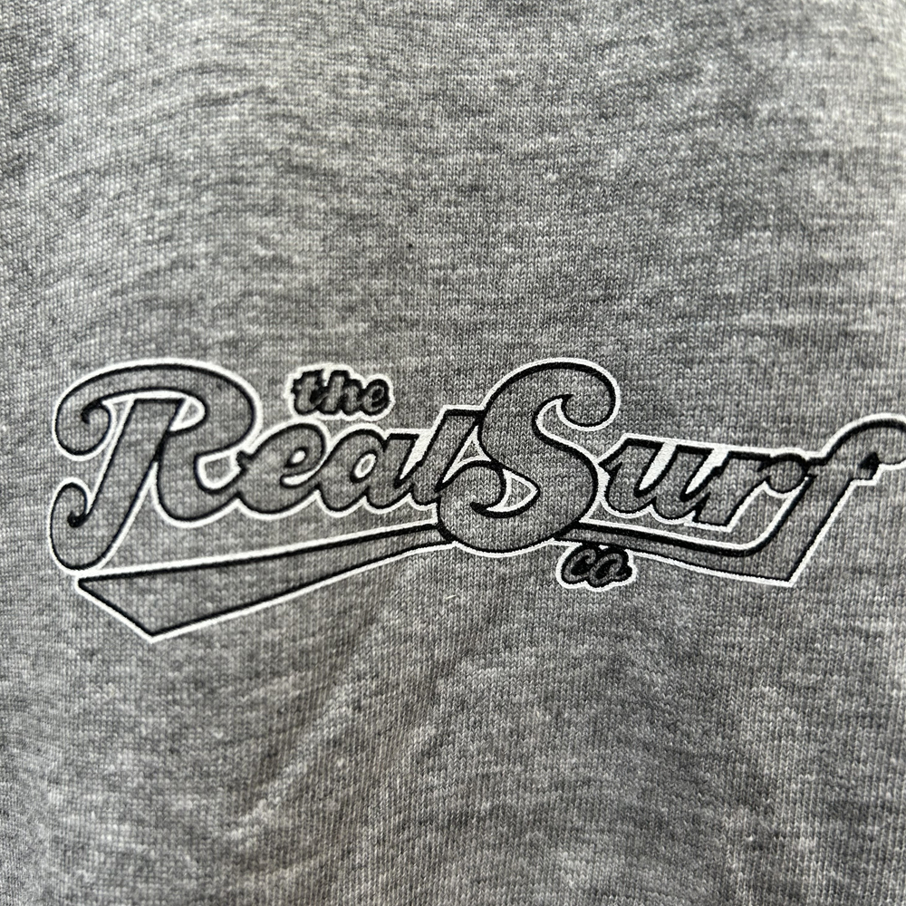 REAL SURF CLASSIC LOGO S/SL TEE GREY MARLE- 2023